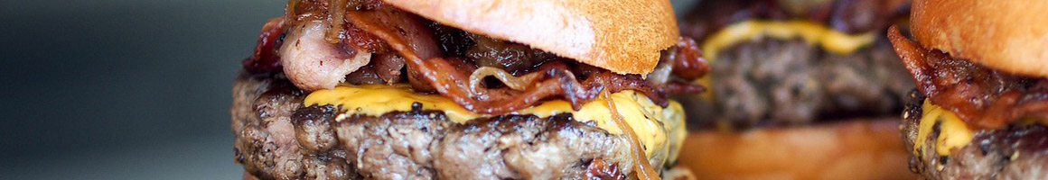 Eating American (Traditional) Burger at Tam's Burgers restaurant in Hesperia, CA.
